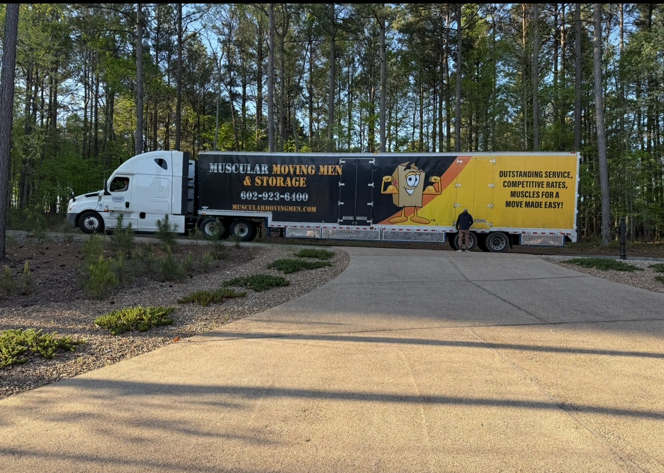 muscular moving men long distance truck