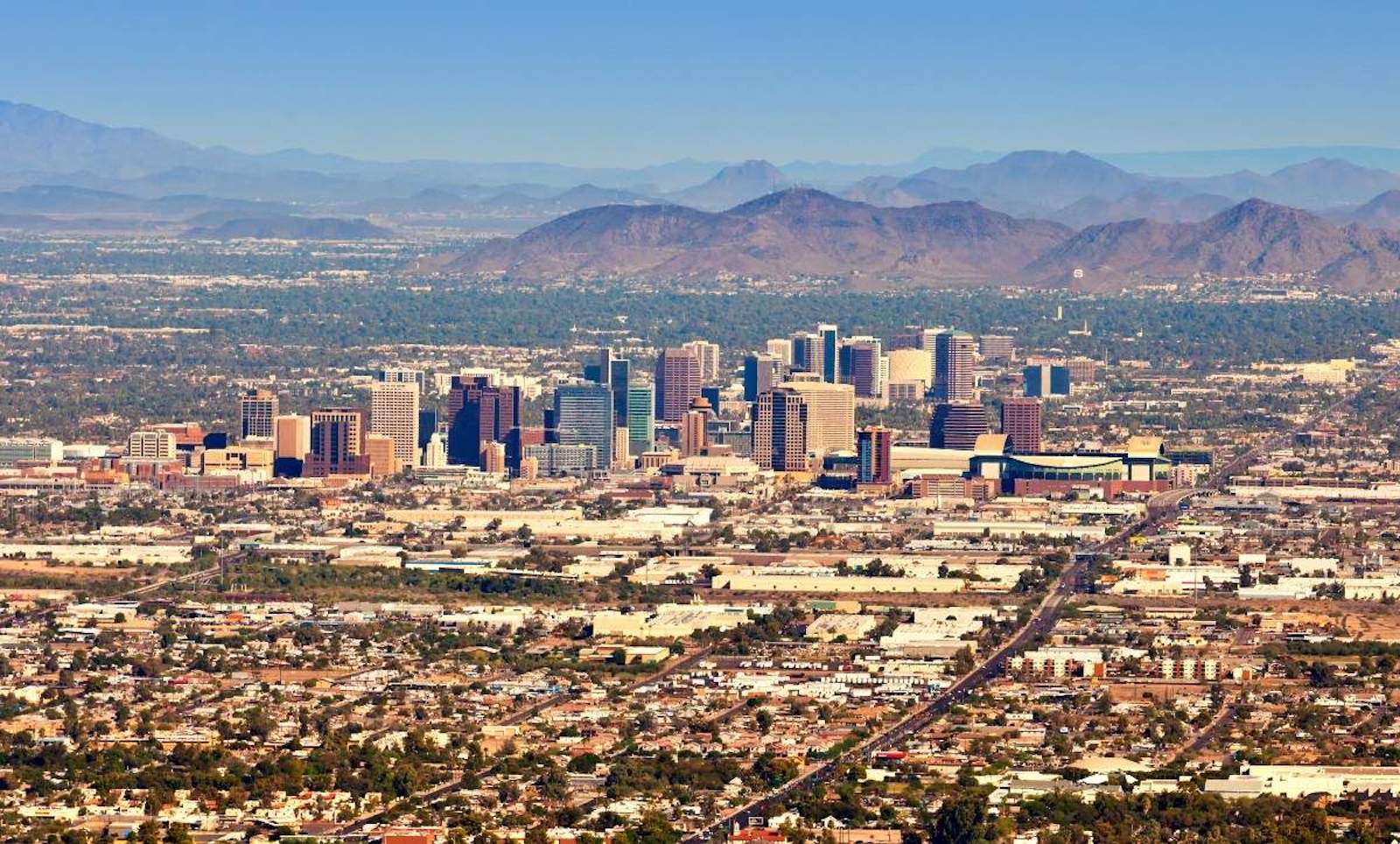 A view of Salt Lake City with mountains visible in the background